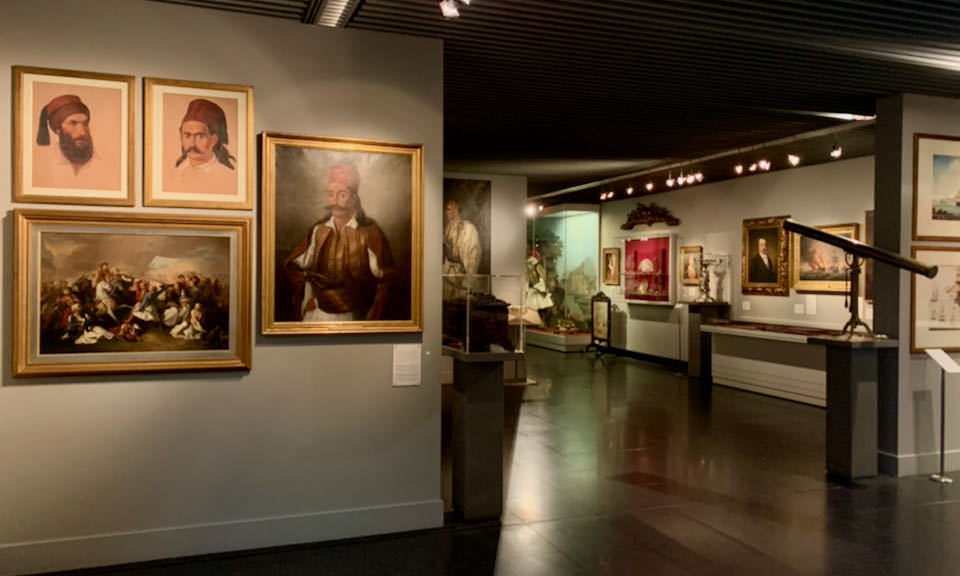 Paintings and artifacts displayed in a museum