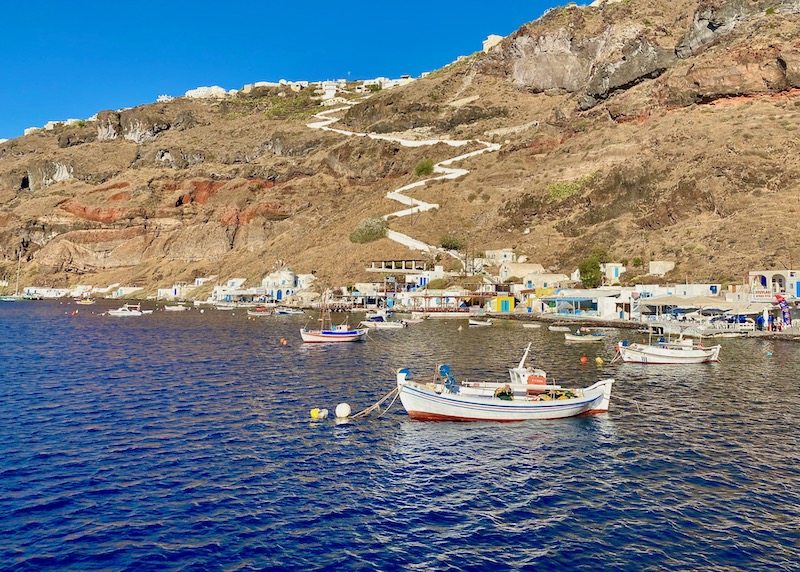 Korfos port and fishing boats in Thirassia island near Oia, Santorini