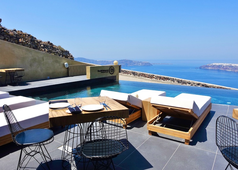 The pool at Tholori Restaurant in Andronis Concept Wellness Resort in Imerovigli, Santorini
