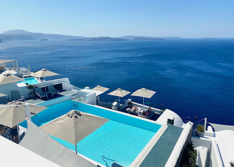 Pool and view from La Perla Villas and Suites in Oia, Santorini