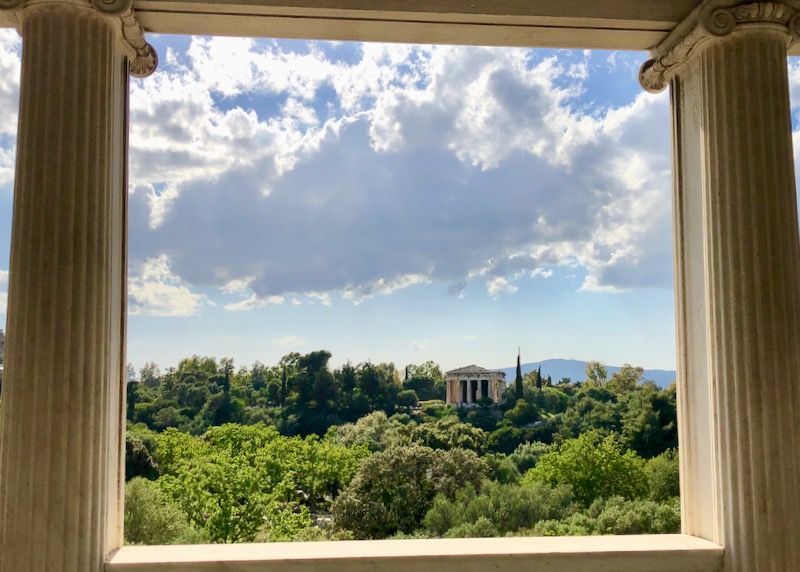 View of the Temple of Hephaestus, framed by marble columns