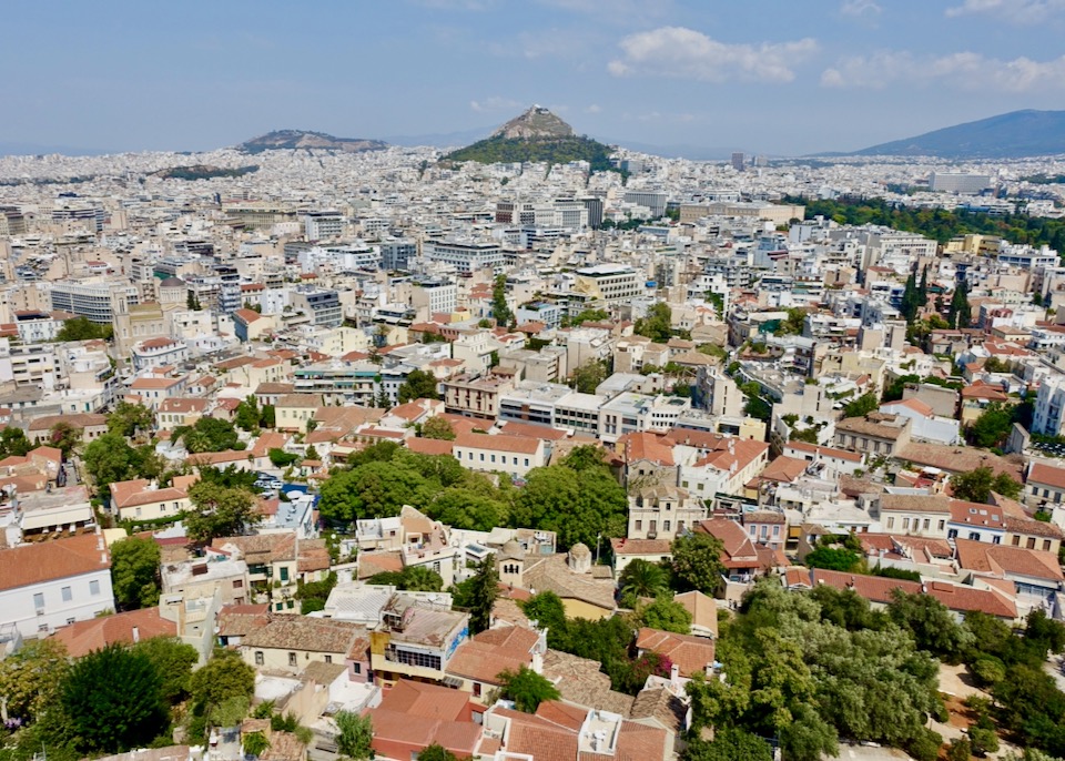Mount Lycabettus, as seen from the Acropolis, with the rooftops of Athens' Plaka neighborhood in the foreground. 