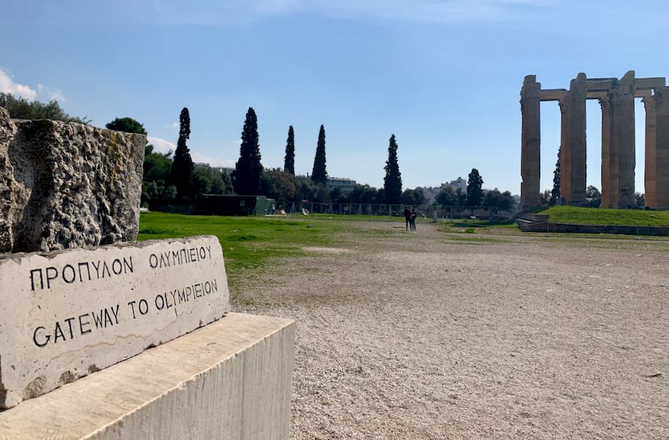 Stone sign pointing to the temple of the Olympian Zeus in Athens.