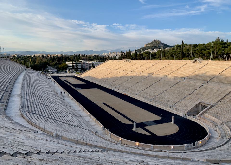 View from the top of the marble Panatheniac Stadium in Athens, with Mount Lycabettus in the distance