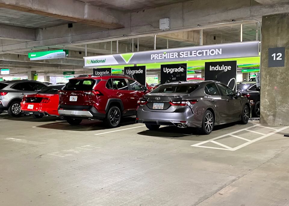 Parked upgraded cars in the National section of the garage.