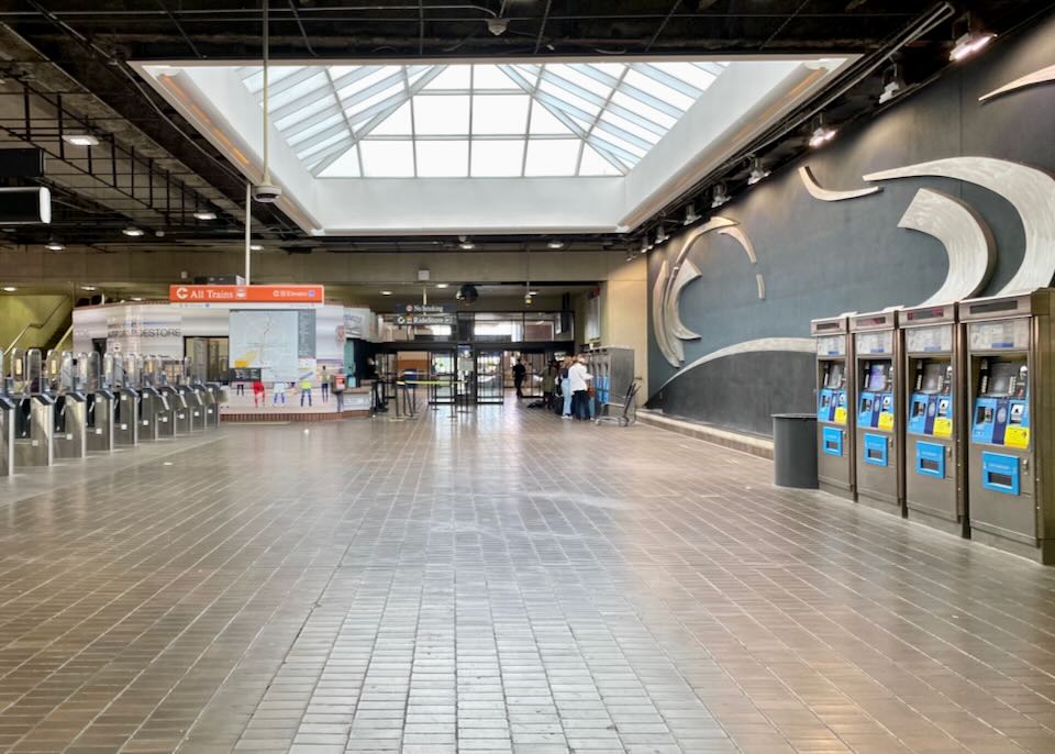 MARTA Train Station with ticket kiosks on the right and the entrance on the left.