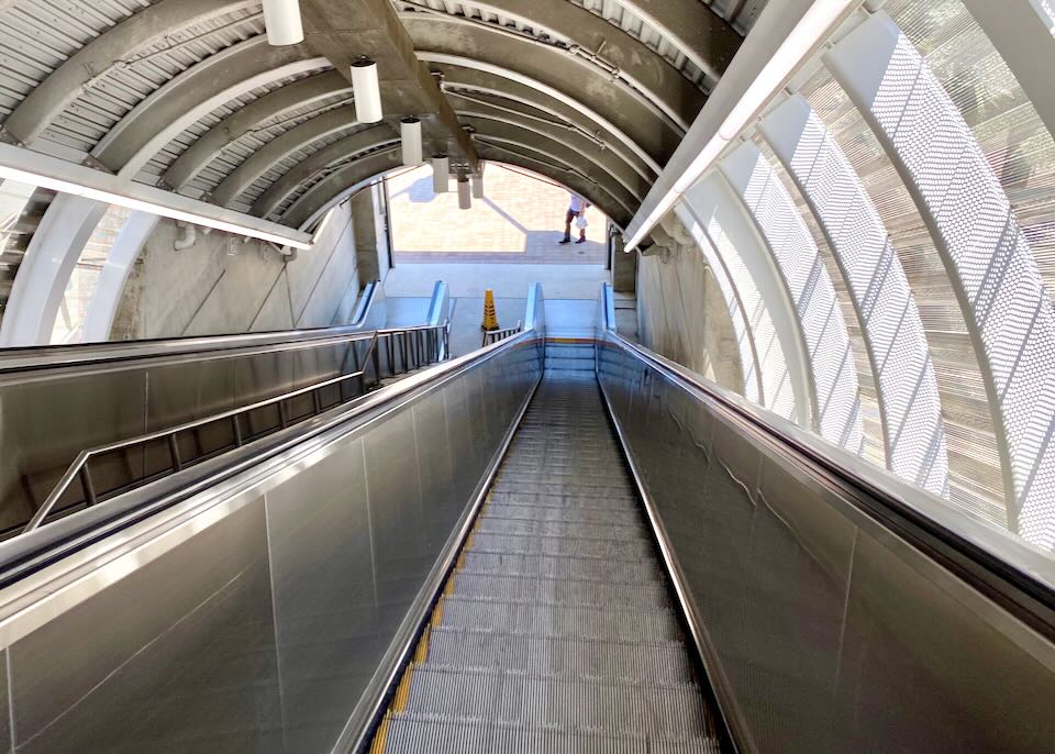 A view of the ride down an escalator.