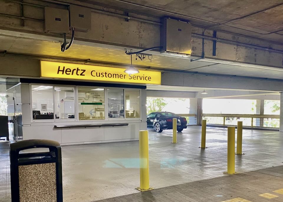 The Hertz customer service center sits and the parking garage.