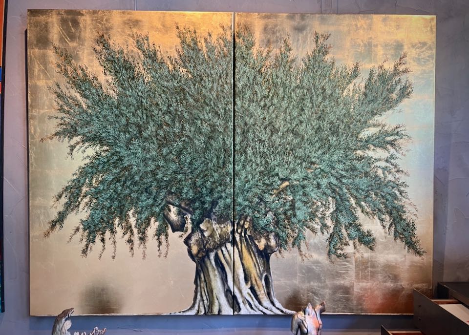 Large painting of an olive tree with a metallic silver background