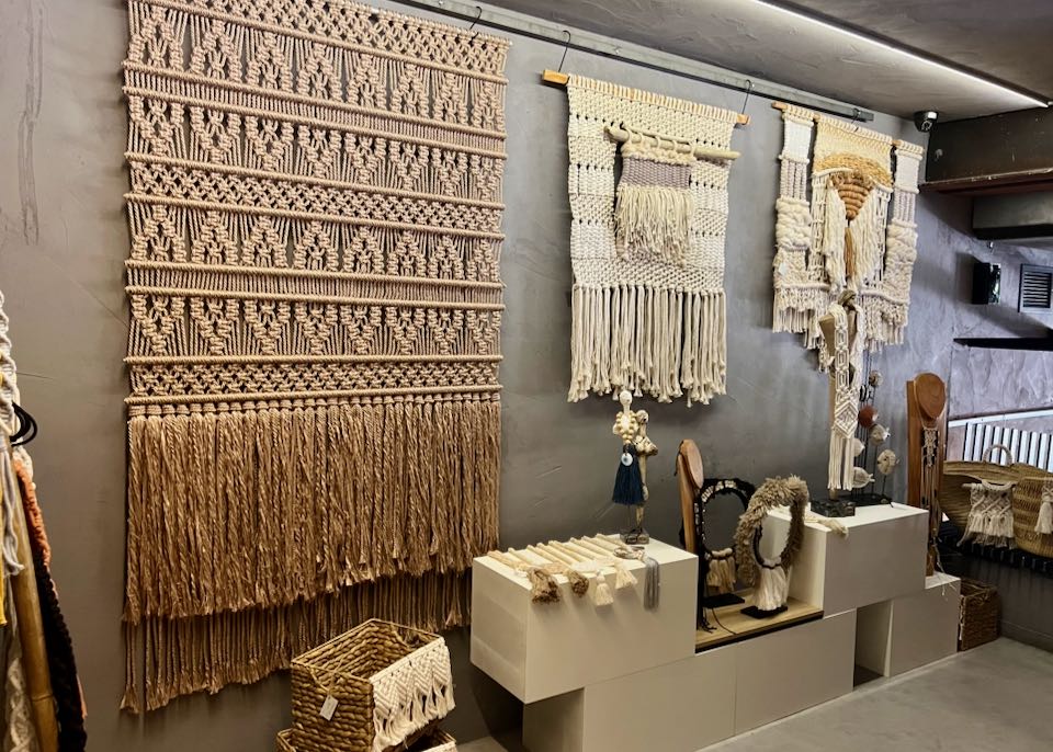 Macrame panels displayed in a gallery