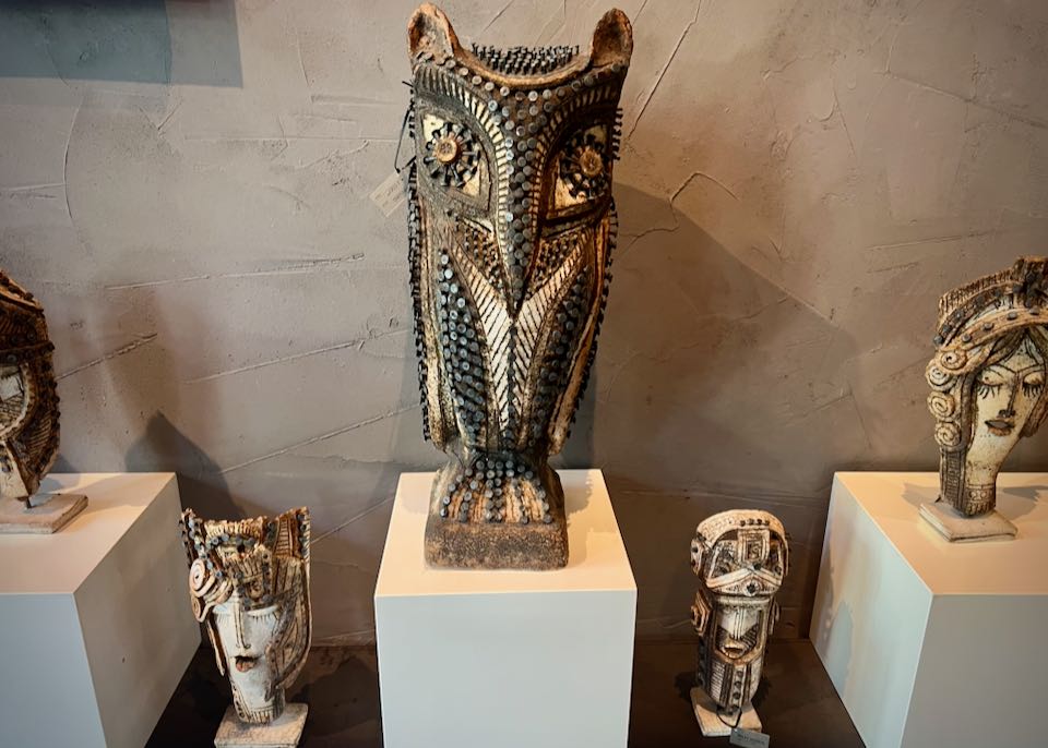 Ceramic and nail sculpture of an owl