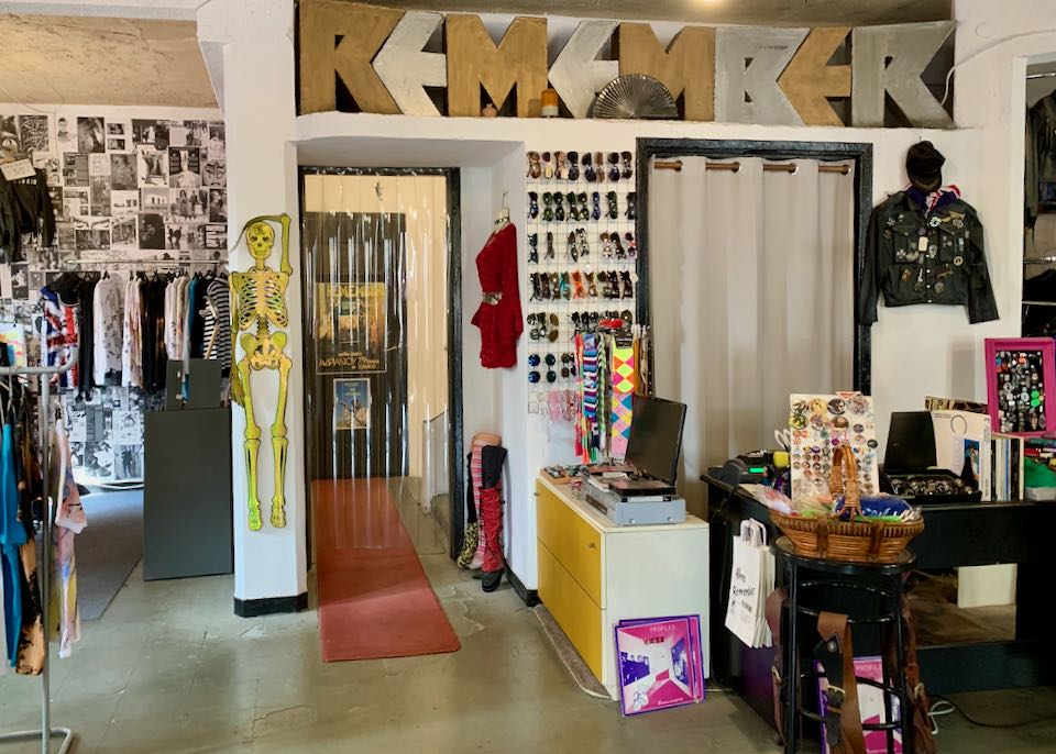 Vintage clothing store with a large sign that says "remember"