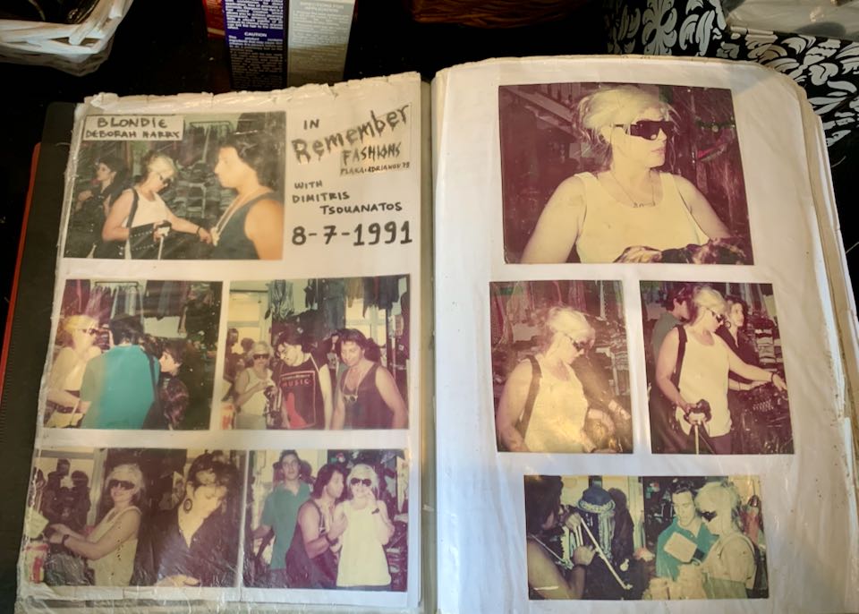 Photo album open to a page with photos of Debbie Harry