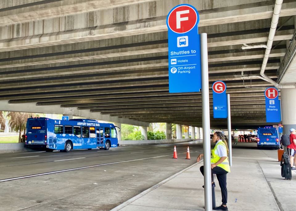 In Section F, a sign shows that it has shuttles to Hotels and Off-Airport Parking.