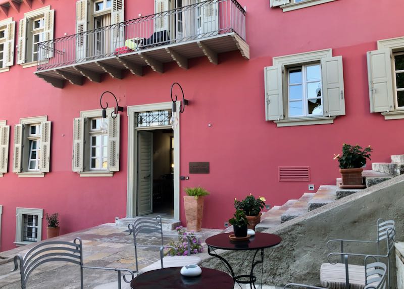 Pink Venetian facade of Grand Sarai hotel in Nafplio, Greece