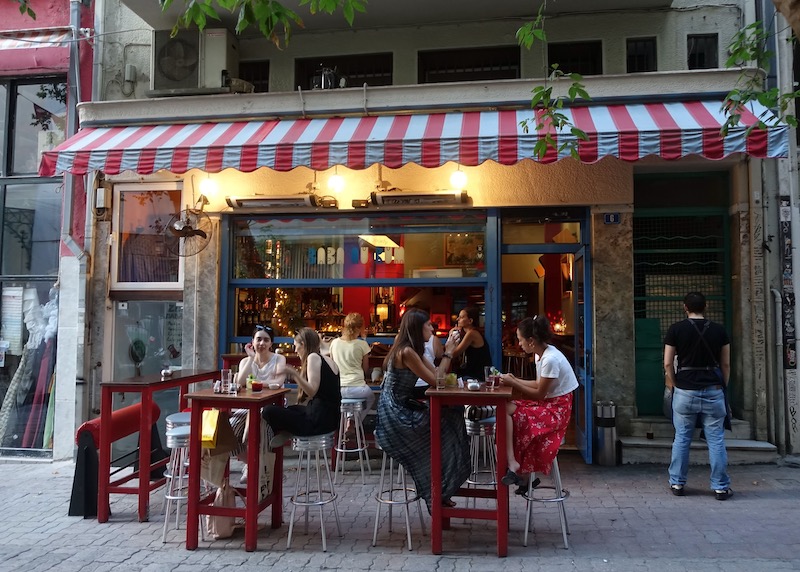 Sidewalk seating in frong of Baba Au Rum bar in the City Center, Athens