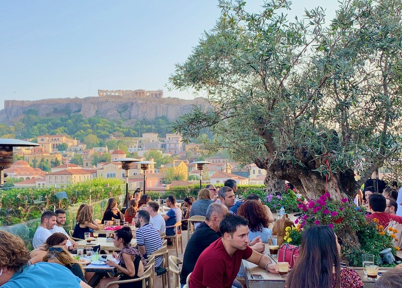 The olive tree and Acropolis view on the rooftop of 360 Degrees in Monastiraki, Athens