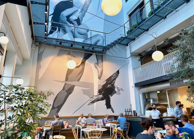The mural at Agora Restaurant and Market in the Ergon House Hotel in Syntagma, Athens
