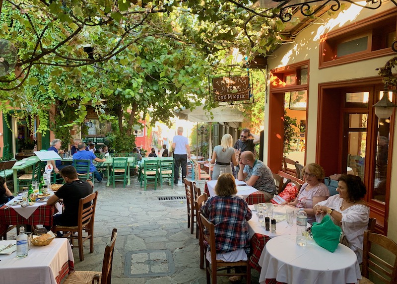 Dining under the trees at Taverna Geros Tou Moria in Plaka