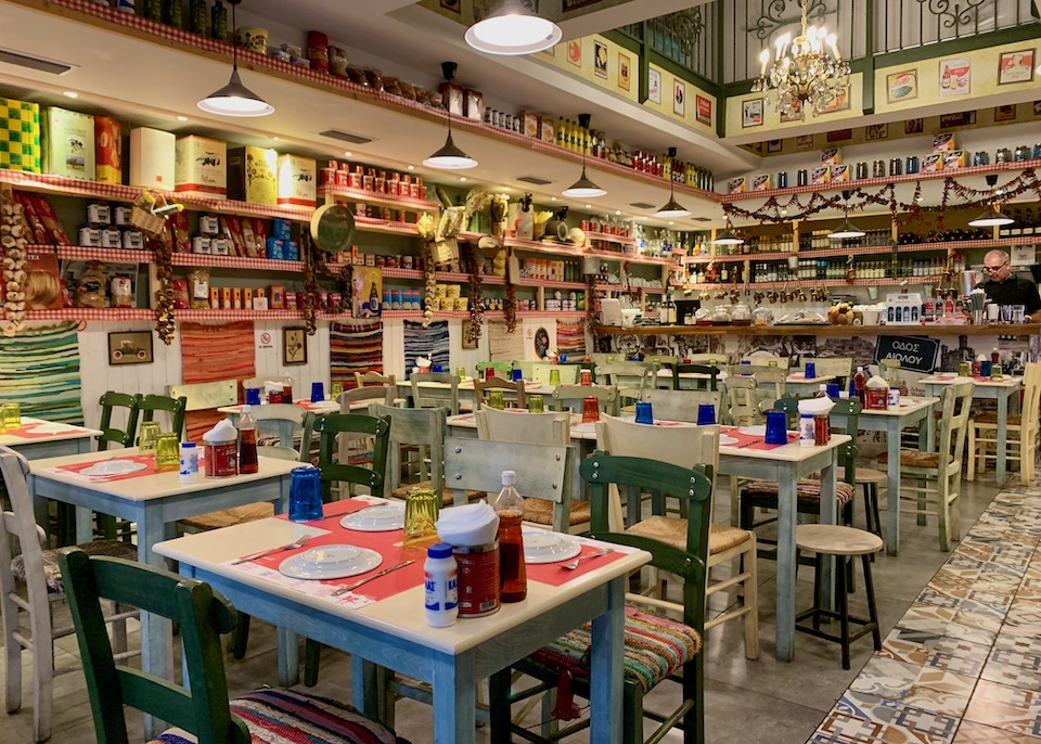 Traditional, colorful dining room at Pame Tsipouro Pame Kafeneio in the City Center, Athens