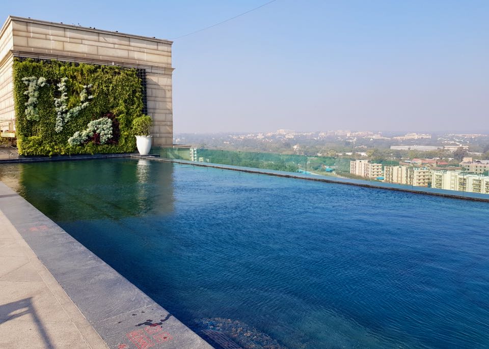 Luxury hotel with heated outdoor pool in Delhi.