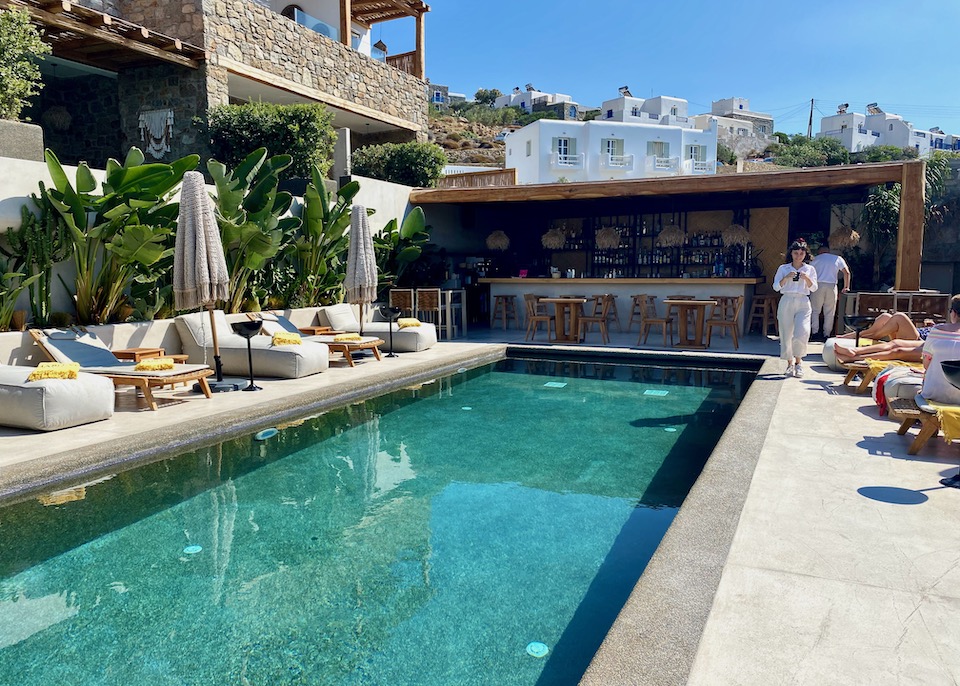 Pool terrace and bar at Habitat Mykonos in Agios Stefanos