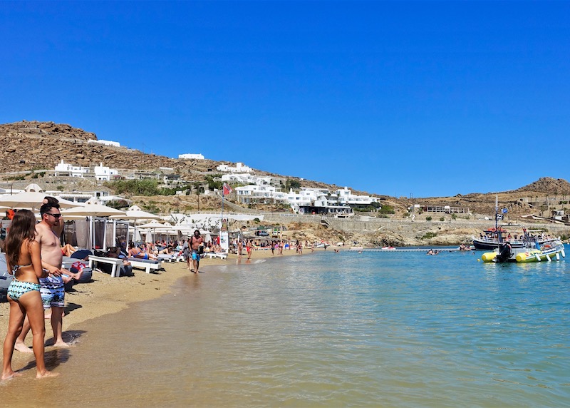 Beach clubs and boats at Paradise Beach in Mykonos