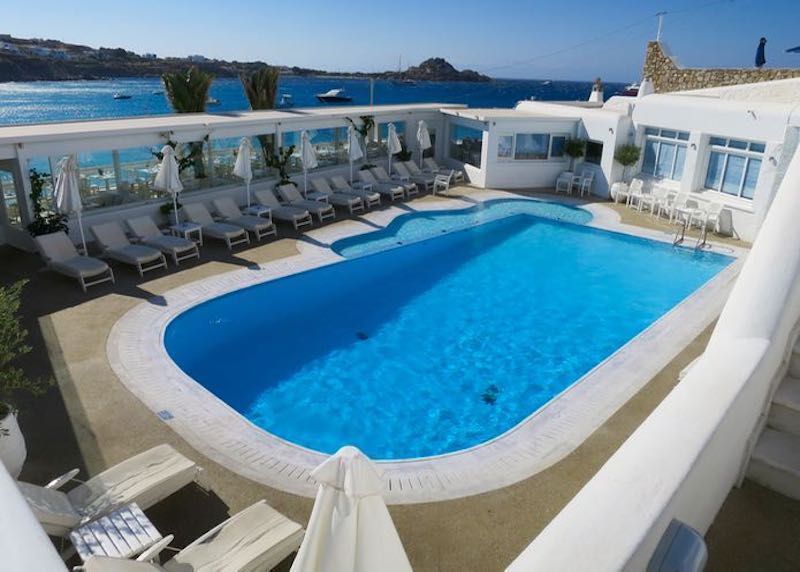 The pool and view from Petinos Beach Hotel on Platis Gialos in Mykonos