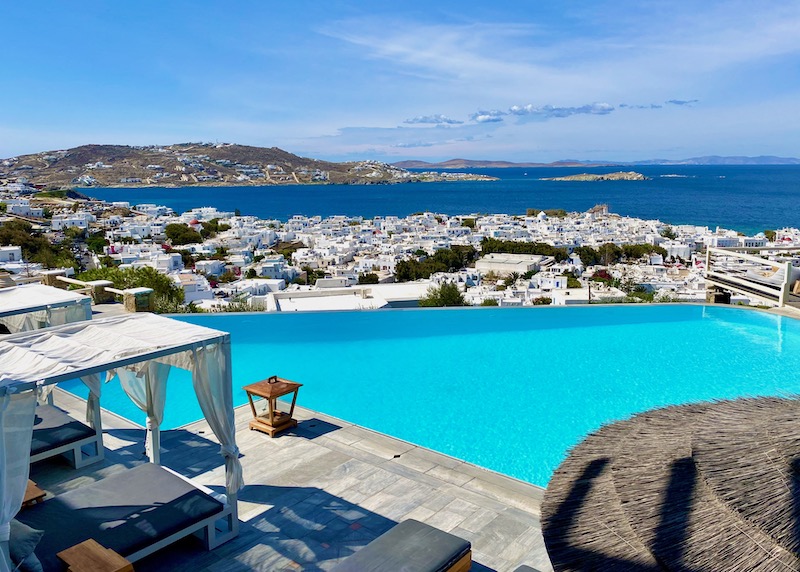 A large infinity pool overlooking Mykonos Town at Vencia Boutique Hotel