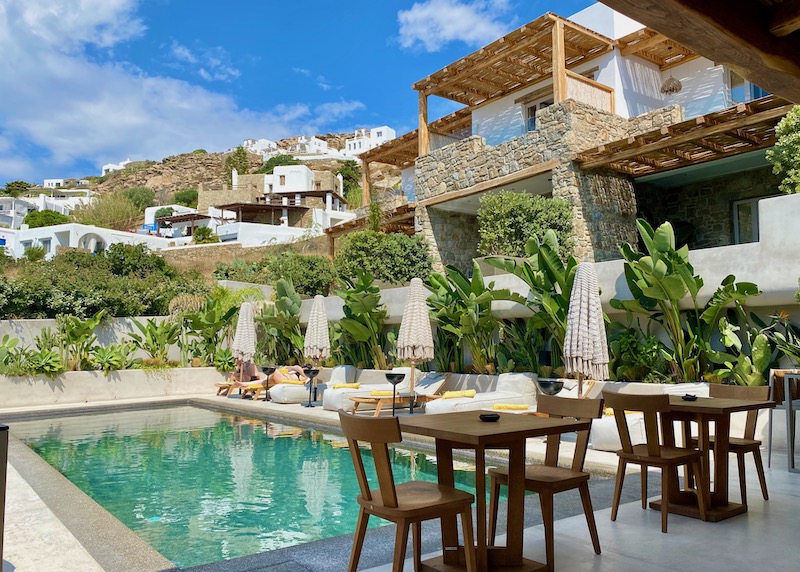 The pool terrace at Habitat All Suite Hotel in Agios Stefanos, Mykonos