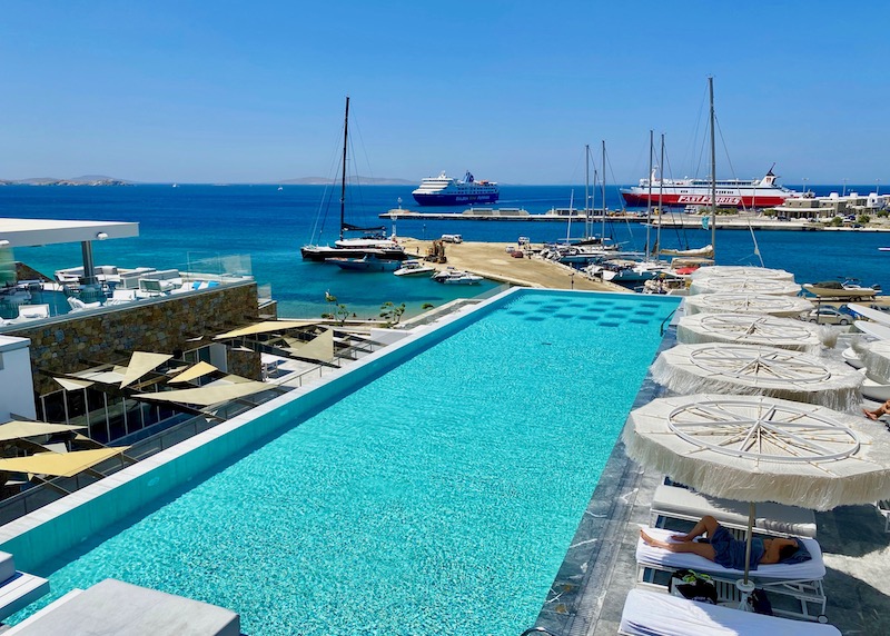 The pool at Mykonos Riviera faces over the ferry port in Tourlos, Mykonos