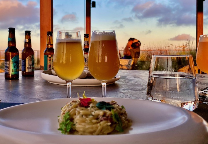 Two beers paird with an orzo dish at Ftelos Brewery in Santorini