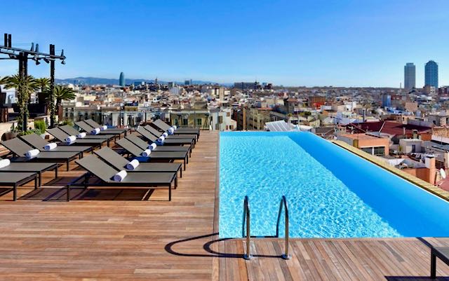5-star hotel in Barcelona with outdoor pool.
