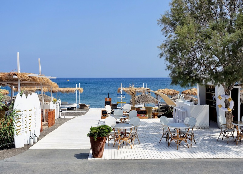 The beachfront bar space at Seaside by Notos on Agios Georgios Beach in Santorini