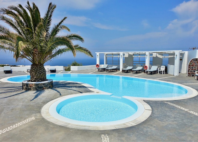 Pool and sea view at Anemomilos Hotel in Oia, Santorini