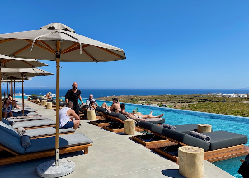 The wraparound pool at Magma Resort in Vourvoulos, Santorini