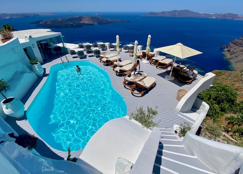 Pool, sun terrace, and view from Sun Rocks in Firostefani, Santorini