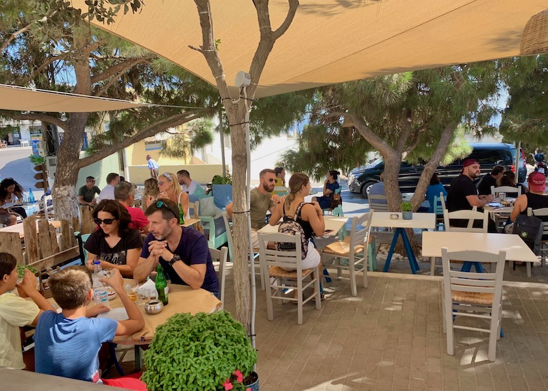 Shaded patio dining at Kantouni in Pyrgos, Santorini
