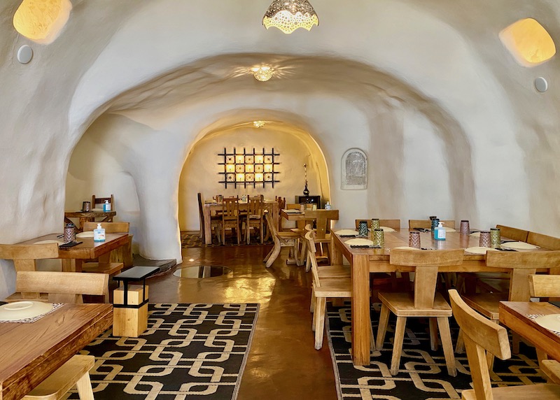 Cave-style dining room at Lefkes in Finikia, Santorini