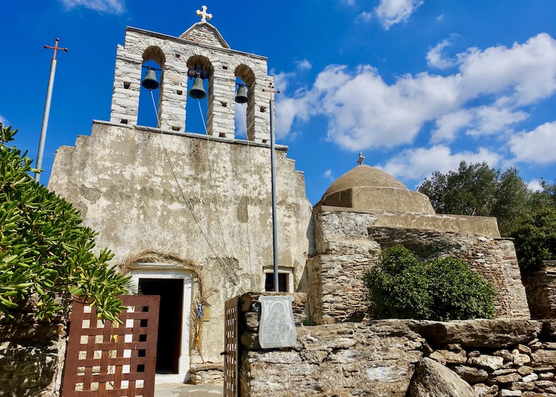 Bell tower and dome of Panagia Drosiani church in Moni, Naxos