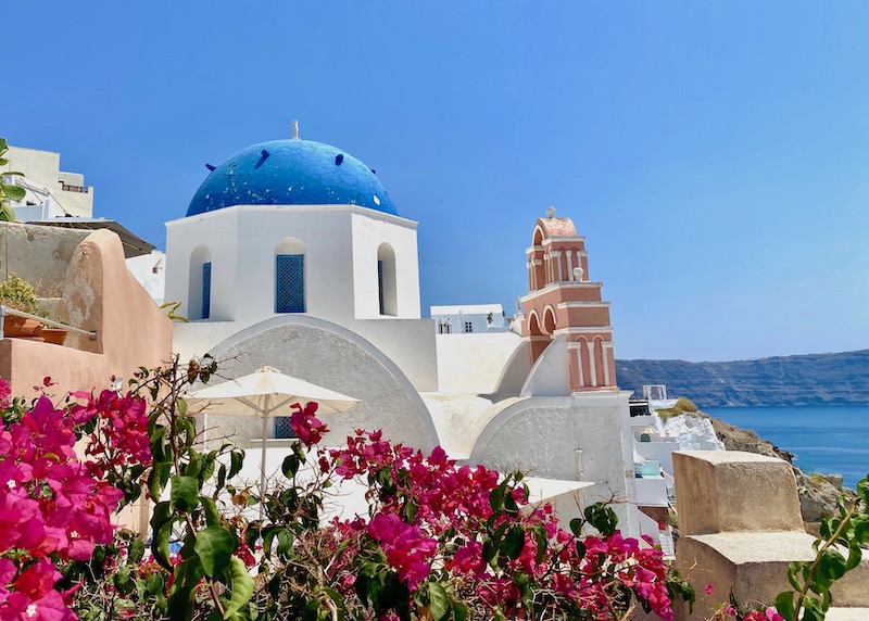 Blue domes, bell towers, and the caldera, perfect for photography tours in Santorini