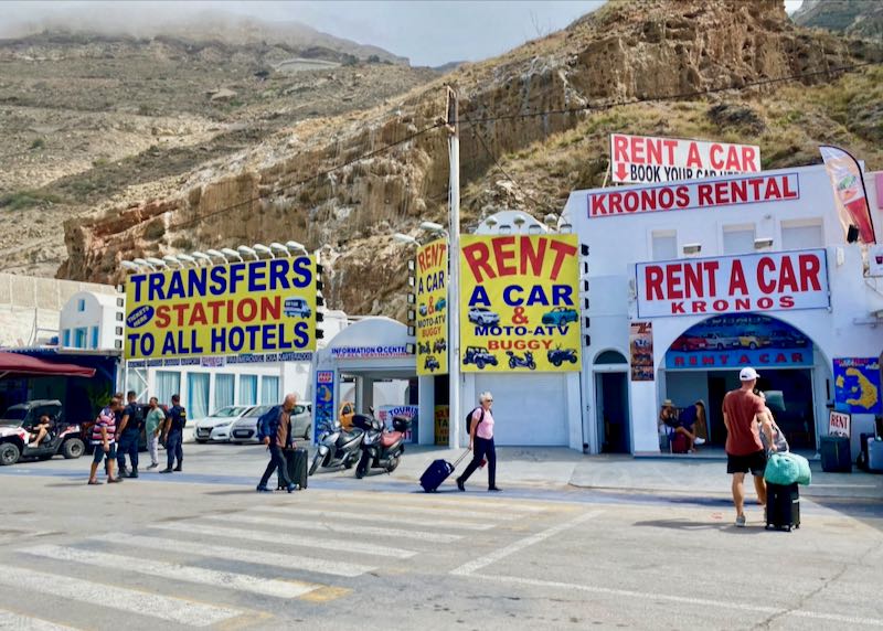 Travel agents at the Santorini ferry port.