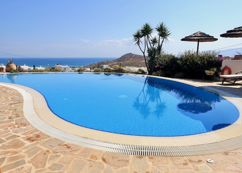 The main pool with a view to the sea at Kavos Boutique Hotel in Stelida, Naxos