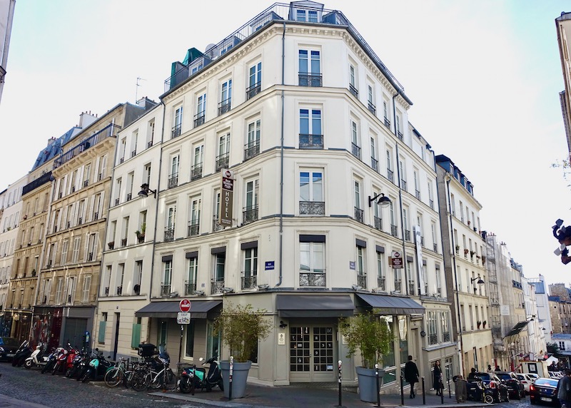 Exterior of the Best Western Plus Litteraire Marcel Ayme with its main entrance on the corner in the 18th Arrondissement of Paris