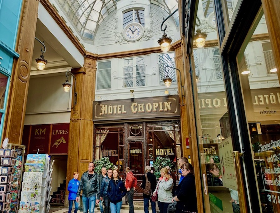 The entrance of Hotel Chopin inside the glass-ceiling Passage Jouffroy in the 9th Arrondissement of Paris