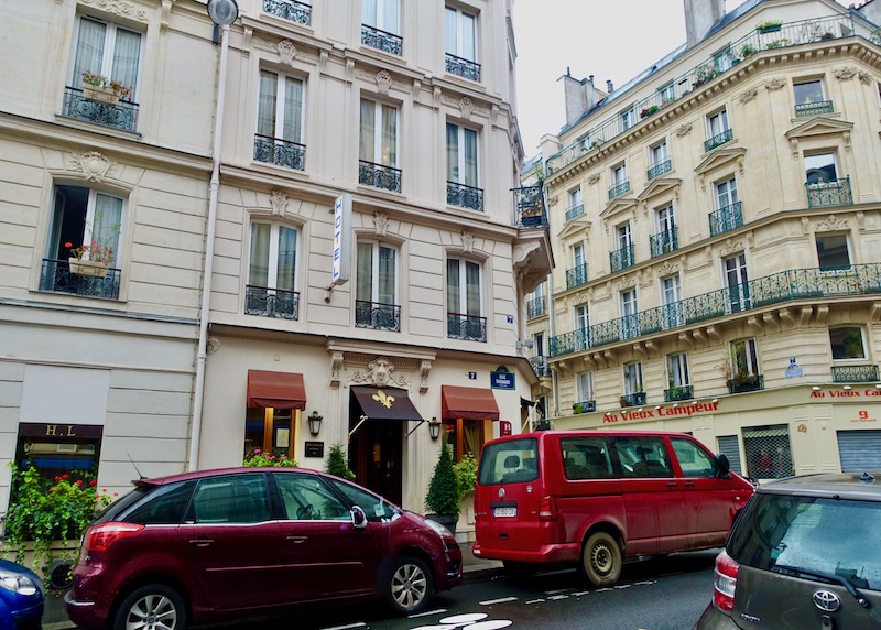 Haussmann-style facade of the Hotel du College de France in the 5th Arrondissement of Paris