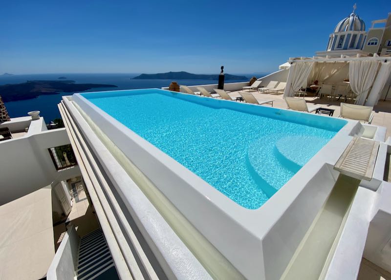 Santorini hotel and pool with caldera view.