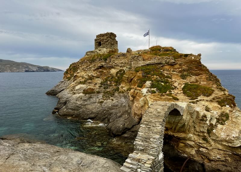 Stone bridge to a small island with castle ruins