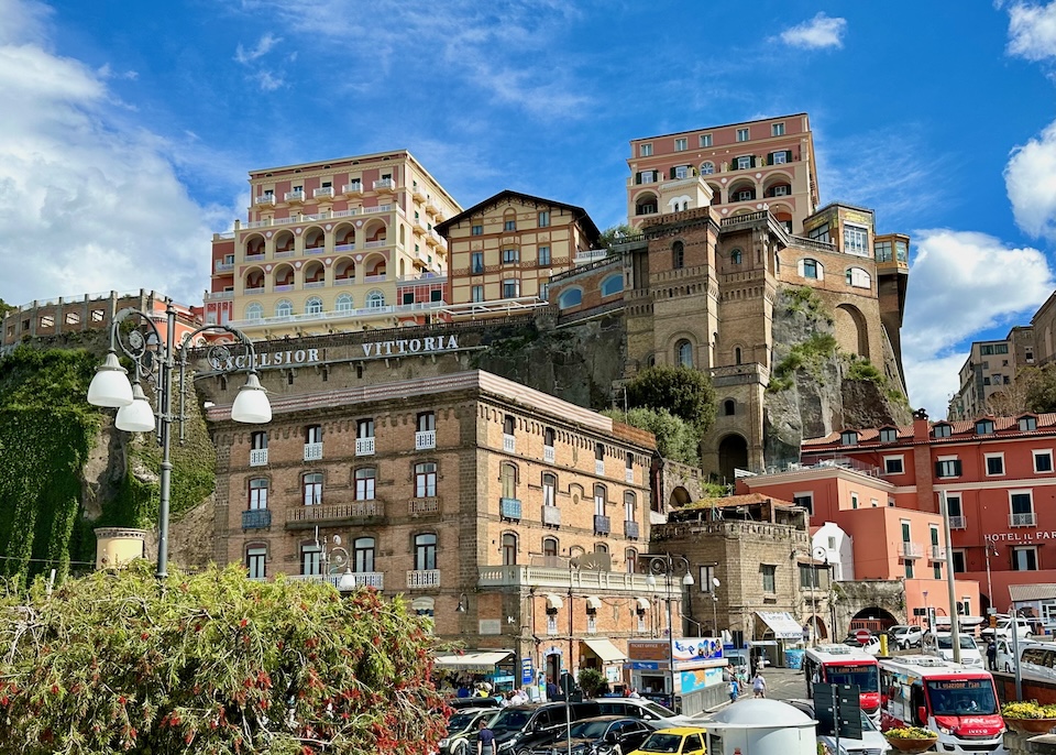 Grand Hotel Excelsior Vittoria on top of a cliff with other hotels at ground level in Sorrento, Italy