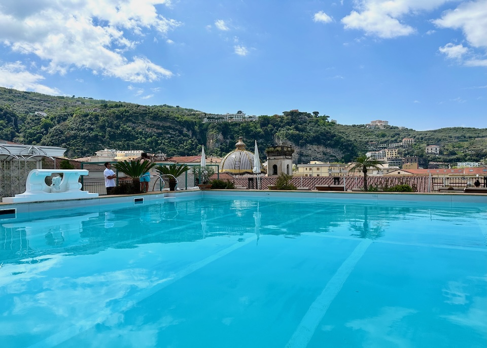Rooftop pool at Grand Hotel La Favorita with a view to the church dome in Sorrento, Italy